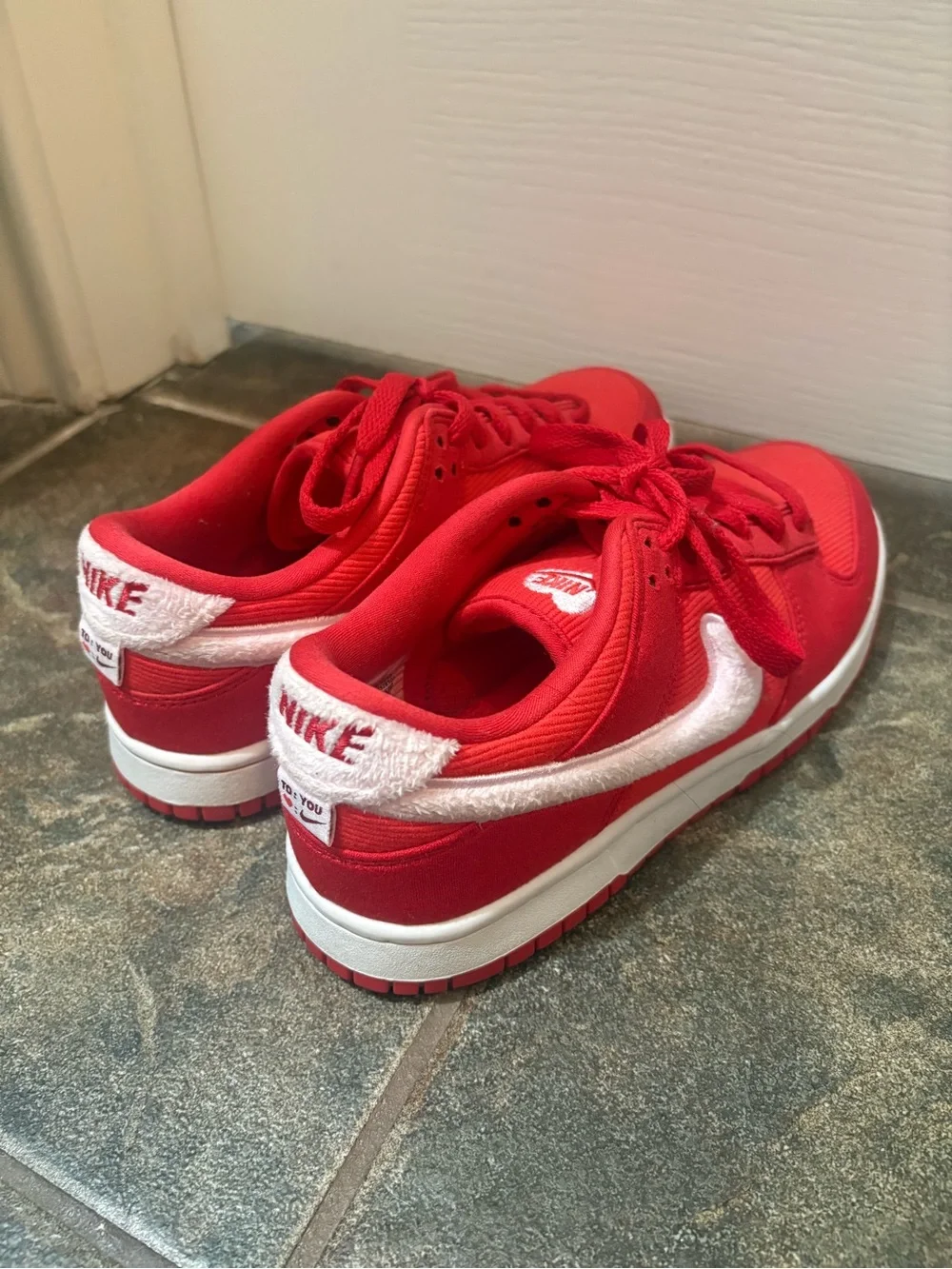 Nike Kids Red Low-Top Sneakers with White Swoosh Accent